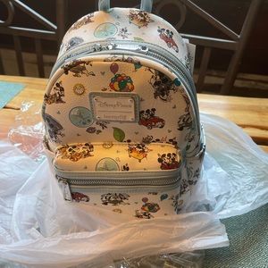 Disney parks Hollywood Minnie’s Runaway Railway Loungefly. NWT